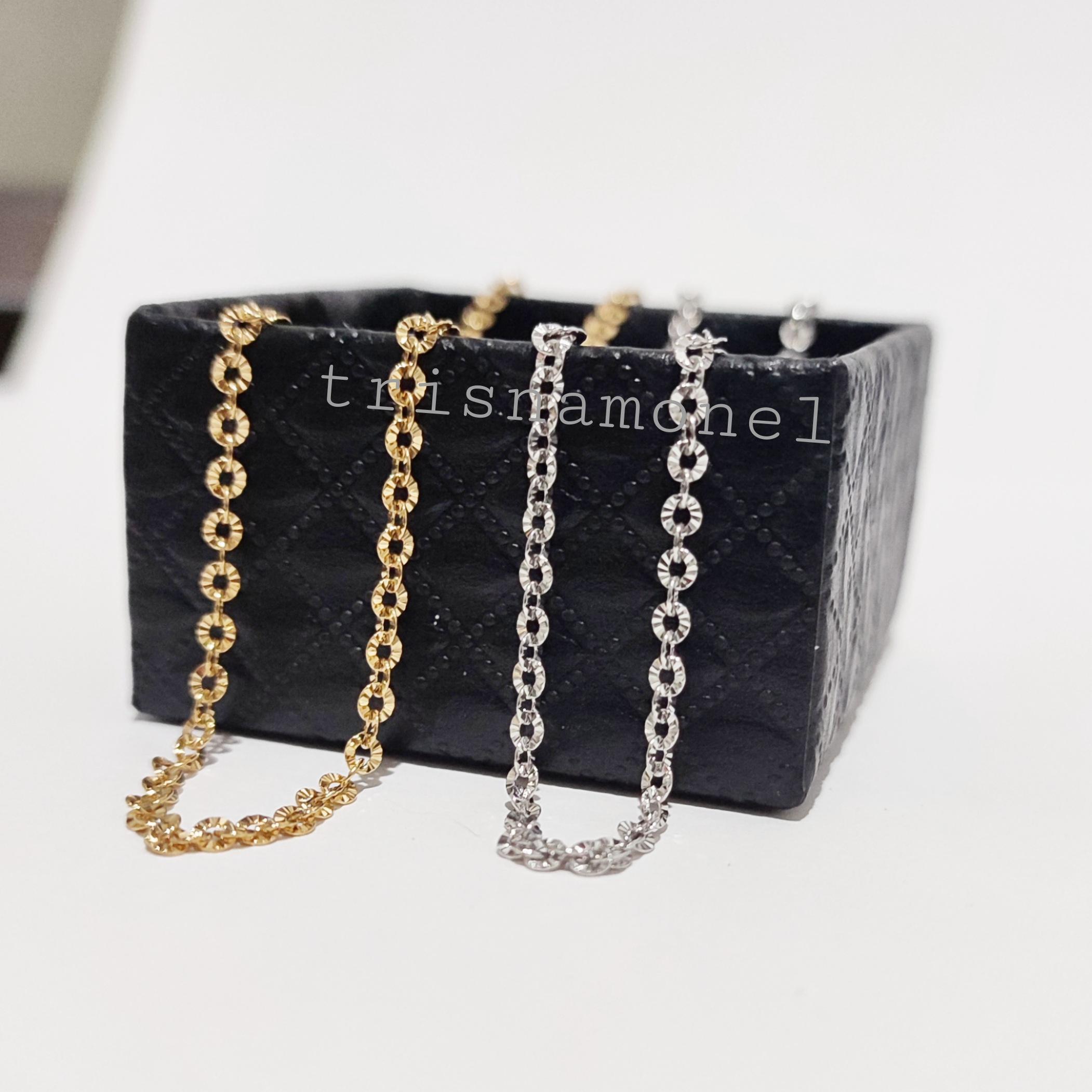 KALUNG TITANIUM MOTIF SINAR GOLD DAN SILVER
